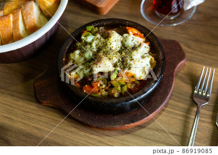 Delicious traditional dish cooked in a pot, which is called Saute in Turkish  86919085