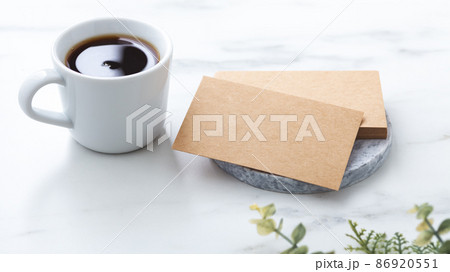 Business card mockup on marble with coffee cup Business card mockup on marble with coffee cup 86920551