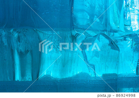 Ice block wall as texture or background. Cold frost transparent bricks pattern 86924998
