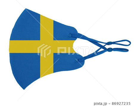Blue cotton reusable cloth protective mask looks as flag of Sweden isolated on white background. Blue cotton reusable cloth protective mask looks as flag of Sweden isolated on white background. 86927235