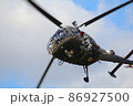 the military helicopter on with the blue sky 86927500