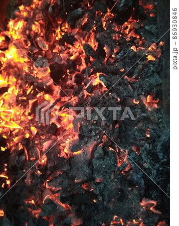 burning hot coals yellow red ornage red spectrum for cooking. Grill food on coals 86930846