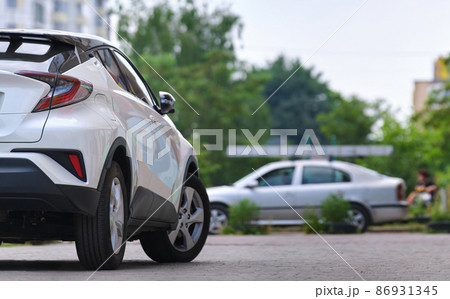Close up of a car parked on city street side. Close up of a car parked on city street side. 86931345