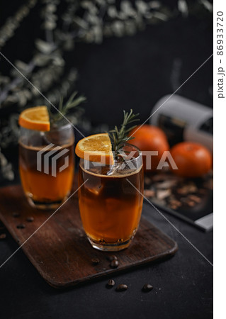 iced americano black coffee and layer of orange iced americano black coffee and layer of orange 86933720
