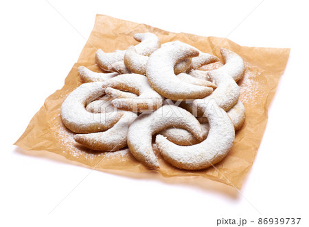 Traditional German or Austrian Vanillekipferl vanilla kipferl cookies isolated on white background Traditional German or Austrian Vanillekipferl vanilla kipferl cookies isolated on white background 86939737