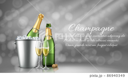 Champagne bottle in ice bucket and two full glasses 86940349