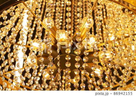 Luxury ceiling crystal chandelier in hotel close-up 86942155