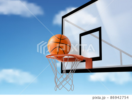 Basketball ball falling into ring net at backboard 86942754