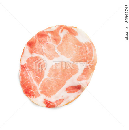 Italian dried ham. Coppa Stagionata isolated on white background. Italian dried ham. Coppa Stagionata isolated on white background. 86947743