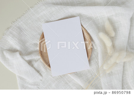 Blank paper cards, Blank greeting card invitation Mockup with flower on desk background, Minimal table workplace composition, flat lay, mockup Blank paper cards, Blank greeting card invitation Mockup with flower on desk background, Minimal table workplace composition, flat lay, mockup 86950798