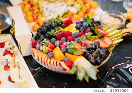 fruit platter on a plate for a festive table. fruit platter on a plate for a festive table. 86955066