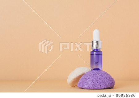 Beauty, spa and wellness concept. Facial cosmetic product, konjac sponge on beige background. Health and medicine concept, beauty and selfcare. Front view, copy space 86956536
