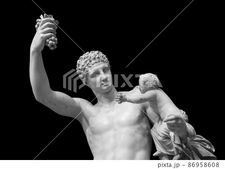 Ancient Greek sculpture of Hermes and the infant Dionysus discovered in 1877 in the ruins of the Temple of Hera isolated on black background with clipping path 86958608