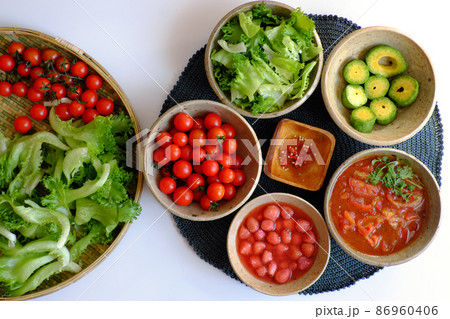 Vietnamese healthy food with vegan ingredient, salad mix with tomato sauce, strawberry, avocado Vietnamese healthy food with vegan ingredient, salad mix with tomato sauce, strawberry, avocado 86960406
