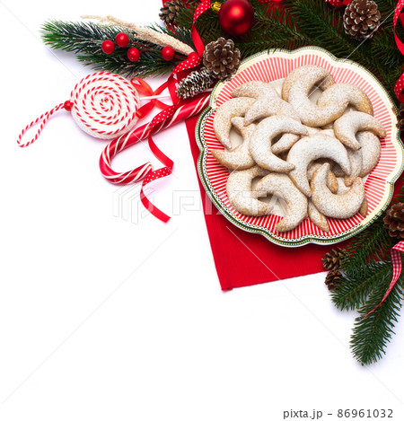 Christmas top view frame composition with copy space - branches, candy cookies and balls 86961032