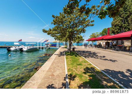 Promenade on Lakeshore of Lake Garda - Bardolino Verona Veneto Italy 86961875