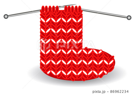 red and white Christmas sock on needles for the holidays... red and white Christmas sock on needles for the holidays... 86962234