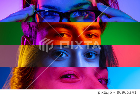 Neon stripes, loines. Closeup human eyes on multicolored background in neon light. Collage made of cropped faces of male and female models. Diversity 86965341