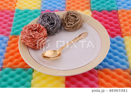 Plate with the gold spoon 86965981