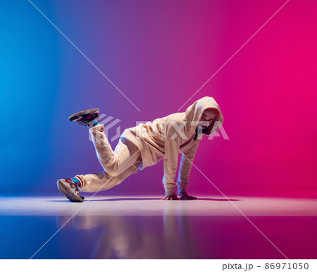 Studio shot of young flexible sportive man... - Stock Photo [86971050] -  PIXTA