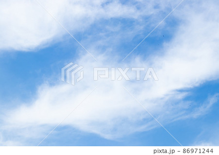 Clear blue color sky with white cloud background Clear blue color sky with white cloud background 86971244