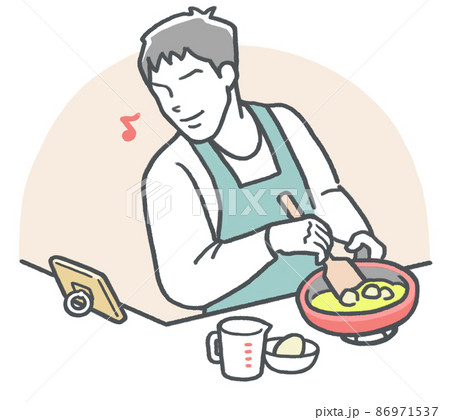 スマホでレシピを見ながら、キッチンで料理する楽しそうな若い男性 86971537