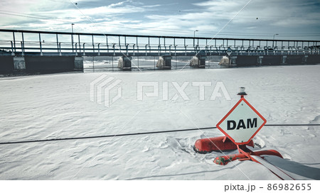 Frozen lake outside of the dam 86982655