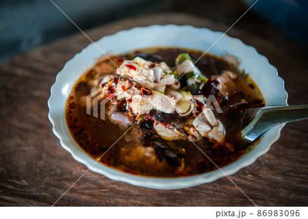 Hot and sour meat soup (Tom Yum) pork or chicken Hot and sour meat soup (Tom Yum) pork or chicken 86983096