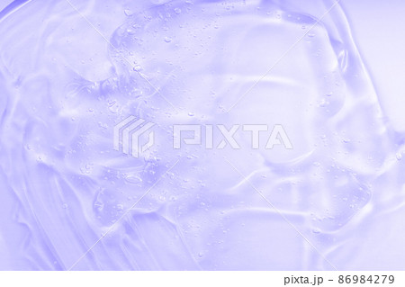 Lilac jelly sanitizer abstract pattern. Cosmetic gel serum background texture. Hyaluronic acid fluid skincare product with bubbles, facial cosmetics with ceramide collagen. 86984279