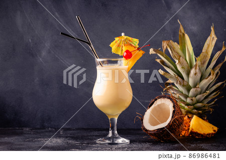 Traditional caribbean cocktail pina colada in a glass. Traditional caribbean cocktail pina colada in a glass. 86986481