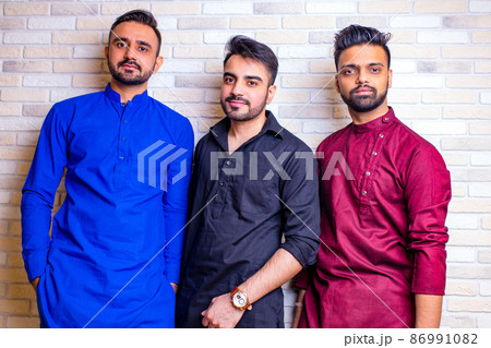 friends from india talking in living room and have fun friends from india talking in living room and have fun 86991082