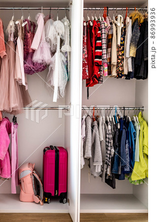 Female childish wardrobe apparel hanged comfortable vertical storage Marie Kondo minimalist method Female childish wardrobe apparel hanged comfortable vertical storage Marie Kondo minimalist method 86993936