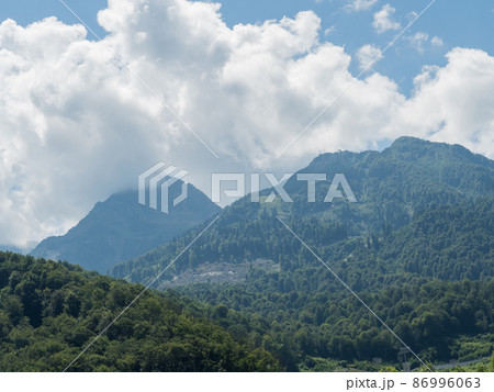 Beautiful mountains in clouds in the red meadow of Sochi 86996063