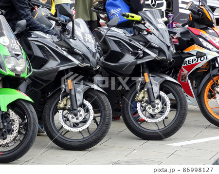 SELANGOR, MALAYSIA - MARCH 4, 2021: Motorcycle tires made from quality rubber. The tires selected must be in accordance with the specifications recommended by the manufacturer. 86998127