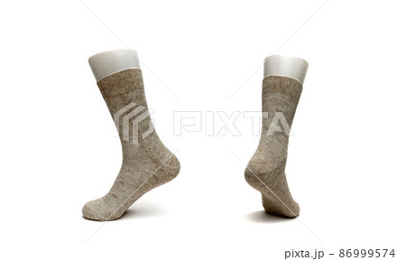 warm women's sock made of wool on a white background warm women's sock made of wool on a white background 86999574