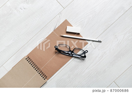 Notepad, glasses, pencil, eraser 87000686