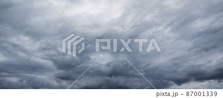 Cloudy dark stormy sky panorama. Natural background Cloudy dark stormy sky panorama. Natural background 87001339