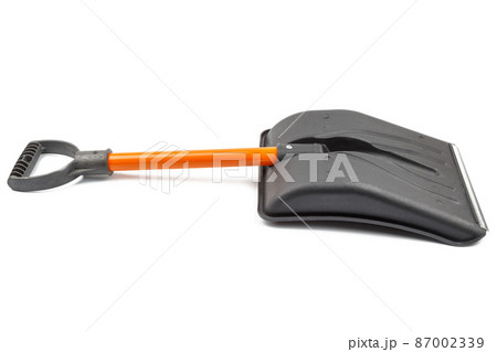 small plastic snow shovel, isolated on white background - back side small plastic snow shovel, isolated on white background - back side 87002339