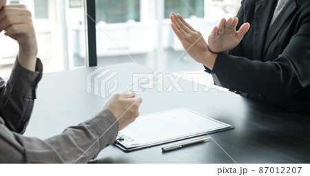Corruption. The businessman denies the money proposed by his partner to bribe the concept of bribery and corruption 87012207