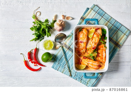 Poached Salmon in hot Coconut Lime Sauce Poached Salmon in hot Coconut Lime Sauce 87016861