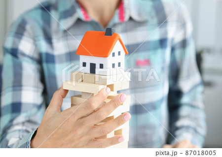 Real estate insurance and safe house construction closeup Real estate insurance and safe house construction closeup 87018005