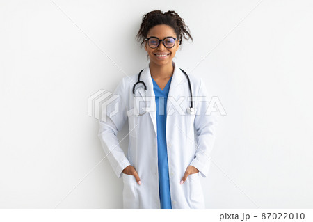 Portrait of black doctor posing with folded arms Portrait of black doctor posing with folded arms 87022010