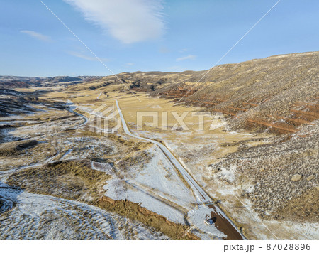 sunset over Colorado foothills 87028896