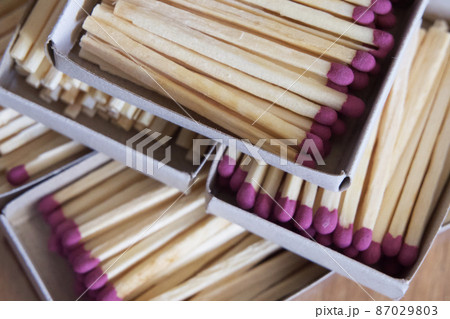 Several boxes filled with matches, a close-up shot. Matchboxes. 87029803