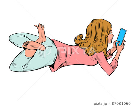 a teenage woman lies and watches a smartphone, lifestyle new technologies, chat on social networks a teenage woman lies and watches a smartphone, lifestyle new technologies, chat on social networks 87031060