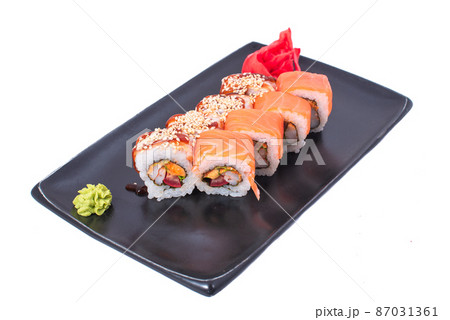 Japanese seafood Sushi roll isolated on white close up. Japanese food restaurant, sushi maki gunkan roll plate or platter set. Maki Sushi rolls with salmon and avocado. Sushi isolated at white Japanese seafood Sushi roll isolated on white close up. Japanese food restaurant, sushi maki gunkan roll plate or platter set. Maki Sushi rolls with salmon and avocado. Sushi isolated at white 87031361