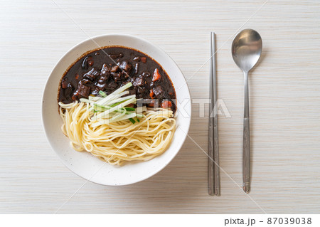Jajangmyeon or JJajangmyeon is Korean Noodle with Black Sauce Jajangmyeon or JJajangmyeon is Korean Noodle with Black Sauce 87039038