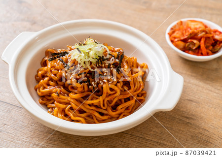 Korean hot and spicy instant noodle with kimchi Korean hot and spicy instant noodle with kimchi 87039421