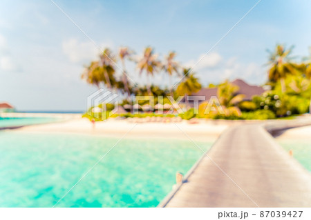 Abstract blur tropical beach and sea in Maldives for background Abstract blur tropical beach and sea in Maldives for background 87039427