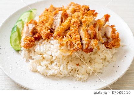 Hainanese chicken rice with fried chicken Hainanese chicken rice with fried chicken 87039516